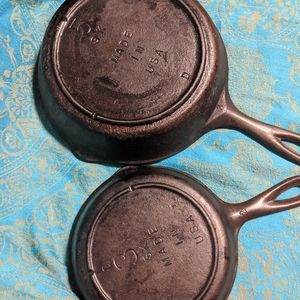Set of two cast iron pans